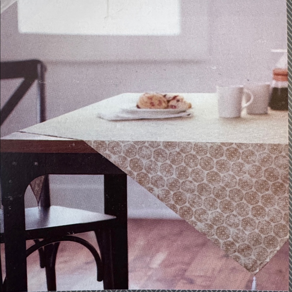 Threshold 50"x50" cotton/linen blend table throw with tassels in cream/beige